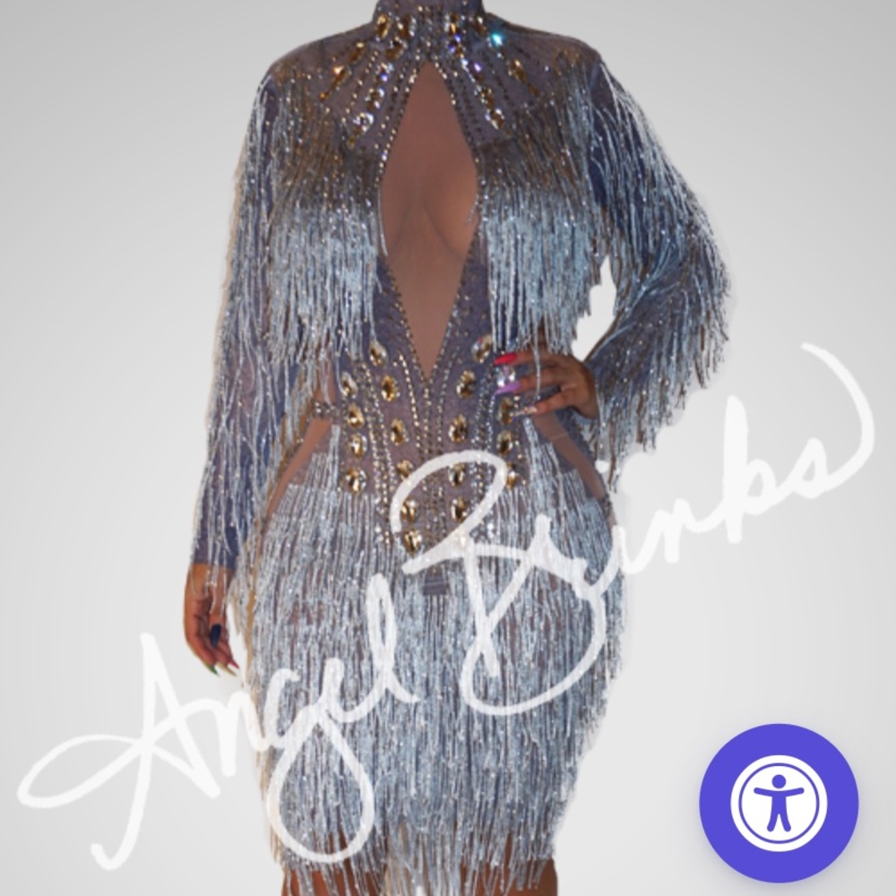 Beautiful Angel brinks custom made dress. size medium, worn once